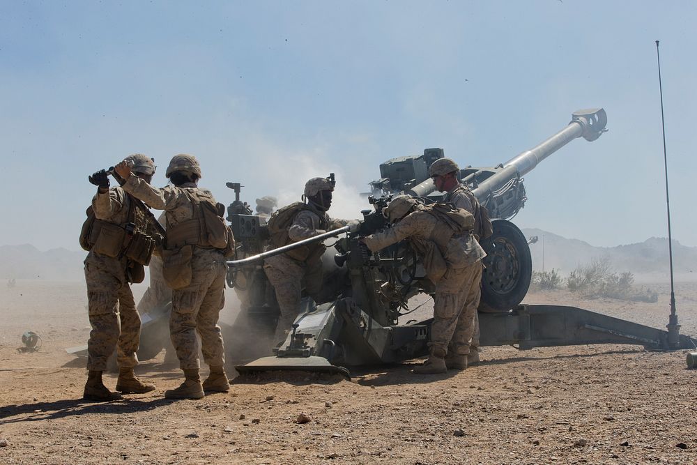 U.S. Marines with India Battery, 11th Marine Regiment, 1st Marine Division, conduct a live fire exercise as part of Weapons…
