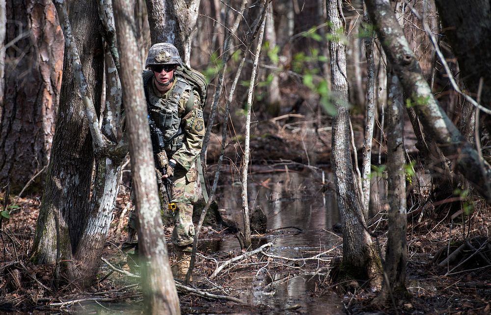 Airman 1st Class Daniel Ross, 822d Base Defense Squadron fireteam member, looks for signs of improvised explosive devices…