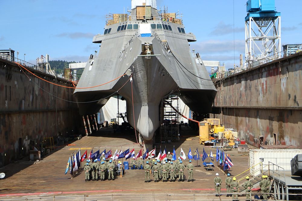 The crew of USS Coronado (LCS 4) listens as Capt. Matthew McGonigle, commodore, Commander, Littoral Combat Ship Squadron…