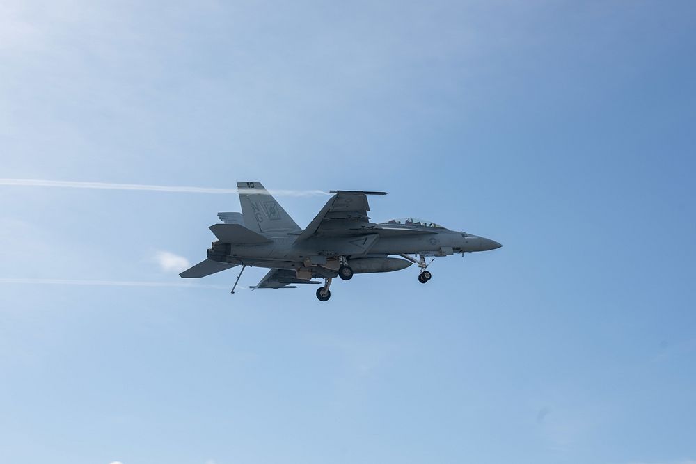 181122-N-PI076-0124..SOUTH CHINA SEA (Nov. 22, 2018) An F/A-18F Super Hornet, with Strike Fighter Squadron (VFA) 41, flies…