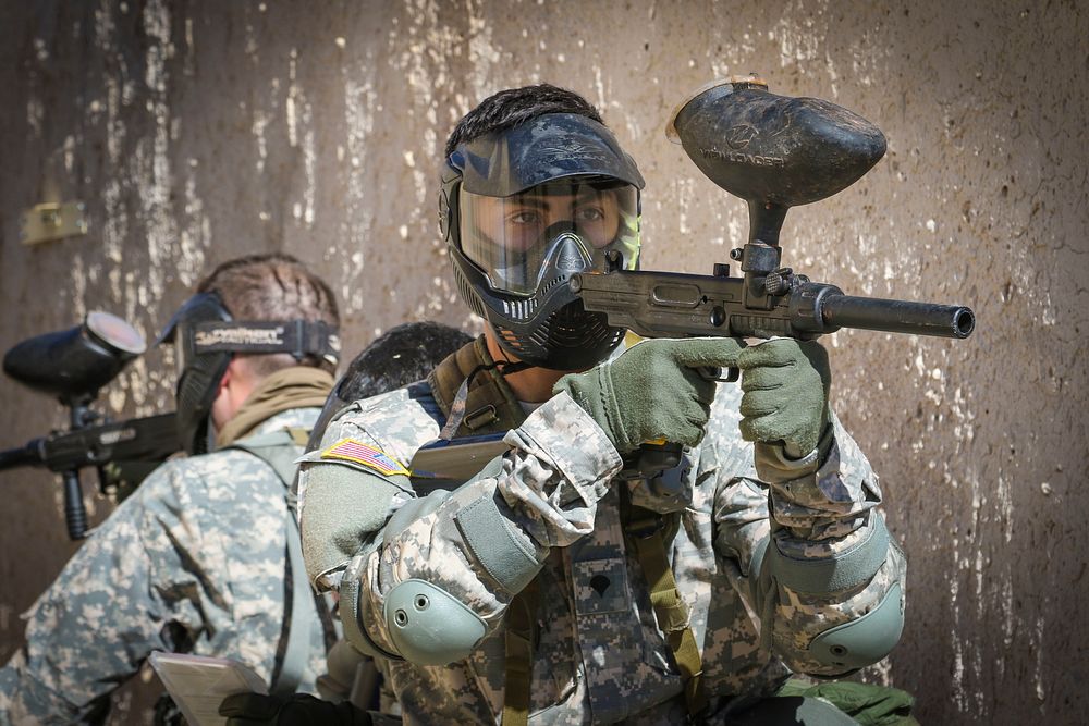 U.S. Army Spc. Julian Ditona, right, a multi-channel transmission systems operator assigned to the 98th Expeditionary Signal…