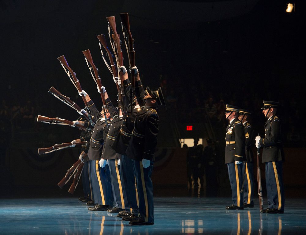 Members of The U.S. Army Drill Team perform at the 242nd Army Birthday Twilight Tattoo, June 14, 2017, at Conmy Hall, Joint…