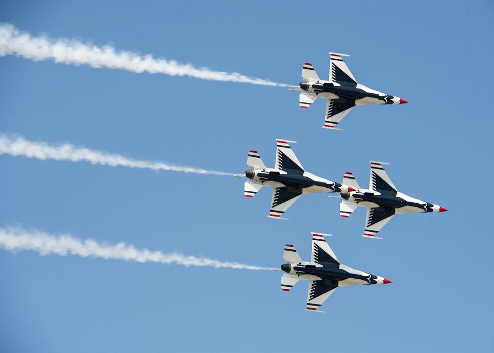 The U.S. Air Force Thunderbirds move into the diamond pass in review over Dover Air Force Base, Delaware, during the Thunder…