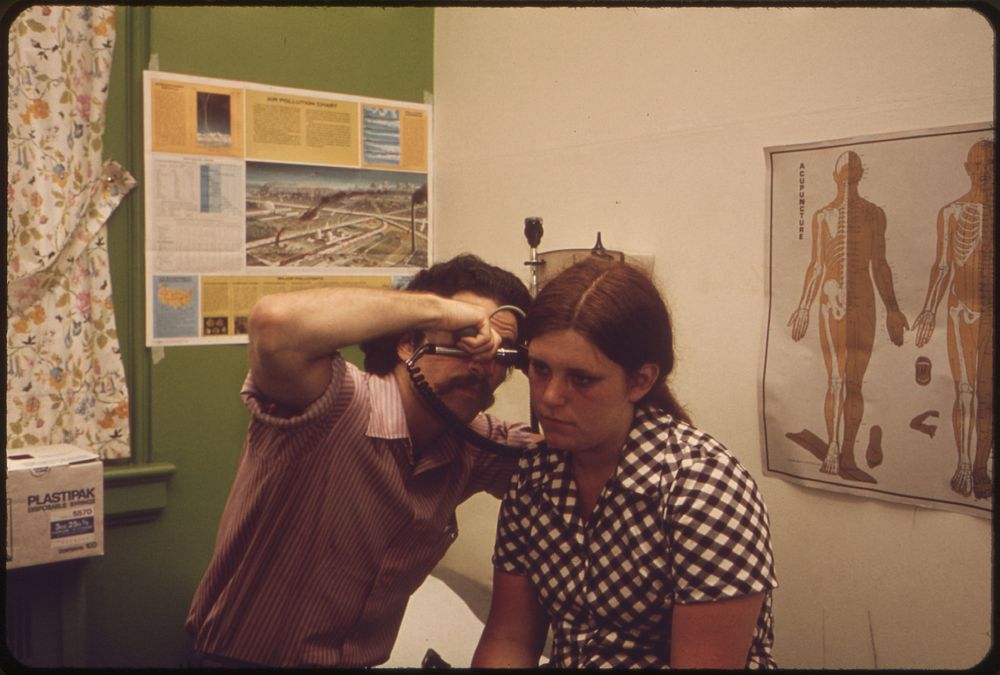 Dr. Epstein of the Paris Street Clinic Examines Donna Delaney's Ears. Original public domain image from Flickr