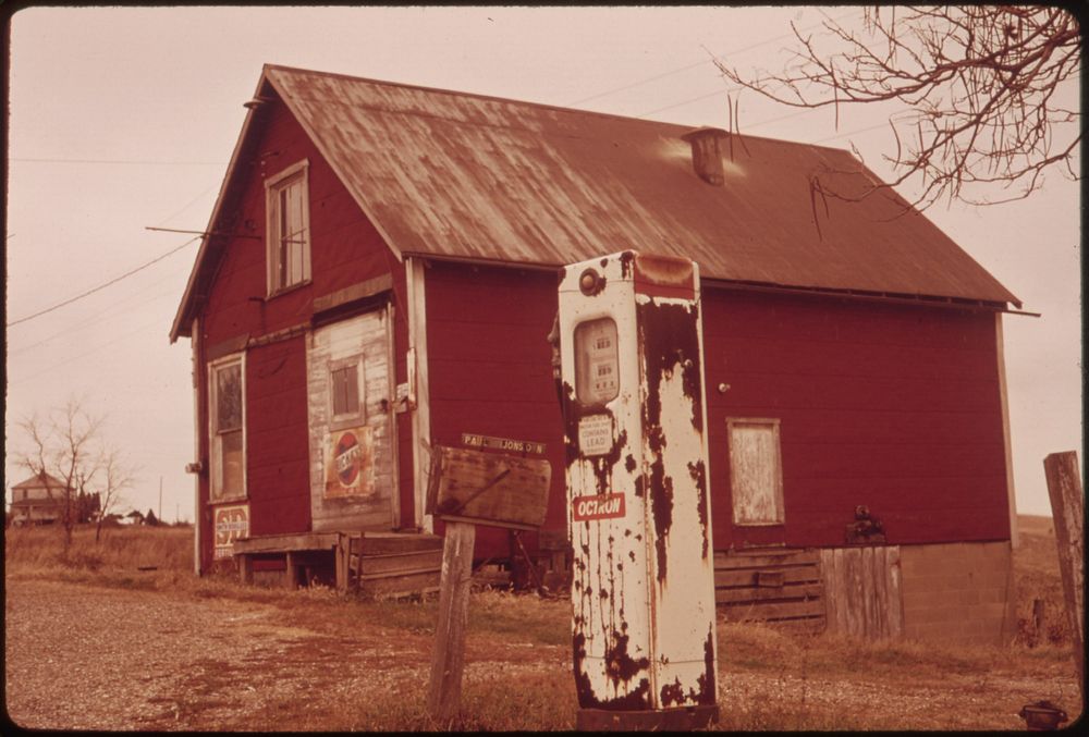 An Abandoned Gas Station near a Stripped Area Off Route 800. 10/1973. Original public domain image from Flickr
