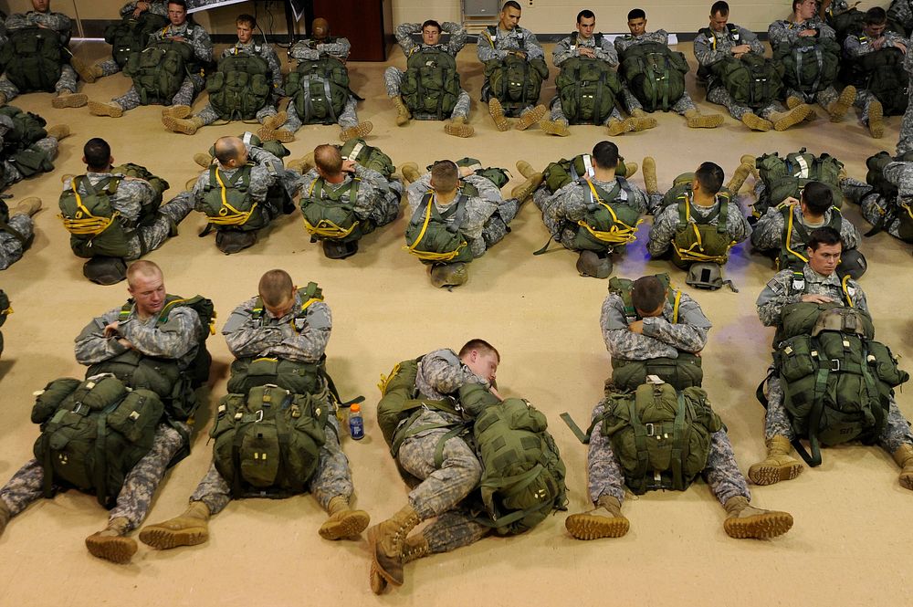 U.S. Army rangers rest while waiting to participate in a mass tactical jump at Fort Benning, Ga., Aug. 3, 2009.