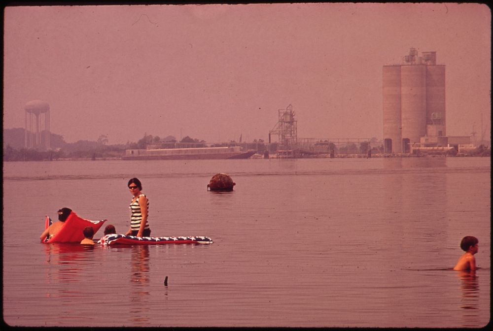 Swimming in Polluted Lake Charles. Olin-Mathieson Plant in Background 06/1972. Original public domain image from Flickr