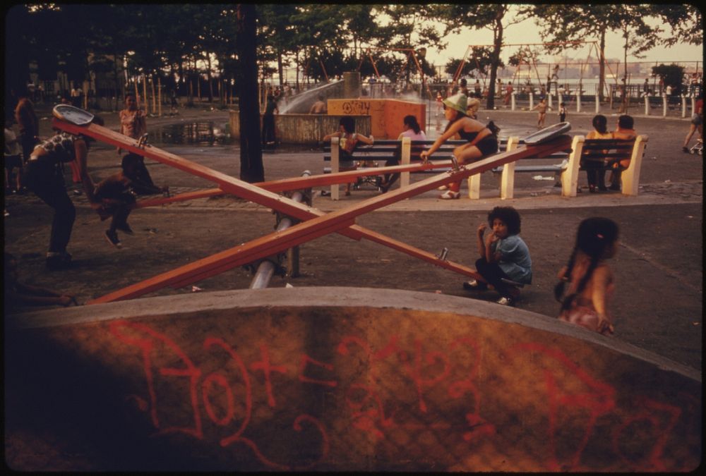 Kids Enjoying Playground Equipment in East River Park in Manhattan, New York City. The Inner City Today Is an Absolute…