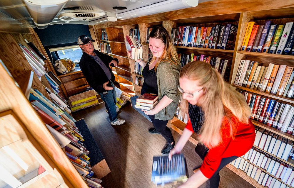 Bookmobile Book TransferVolunteers transfer books to the new Pitt County Bookmobile, December 4, 2017.