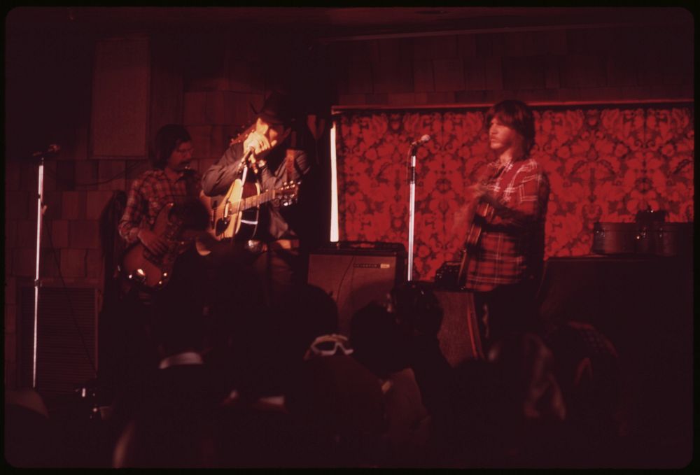 Folksingers Entertain Skiers at End of Day in the Timber Line Bar and Restaurant on Snowmass Mountain 01/1974. Photographer:…