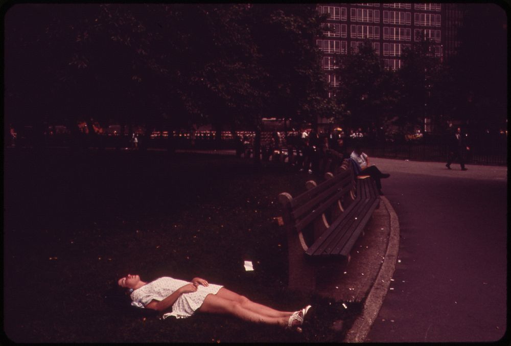 Lunch-Hour Nap in Battery Park, Lower Manhattan 05/1973. Photographer: Blanche, Wil. Original public domain image from Flickr