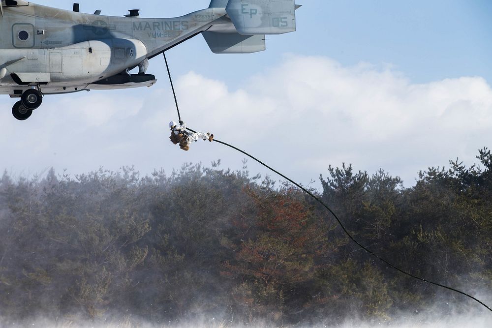 U.S. Marines fast rope out of a V-22 Osprey on Camp Sendai, Sendai, Japan, Feb. 19, 2018.