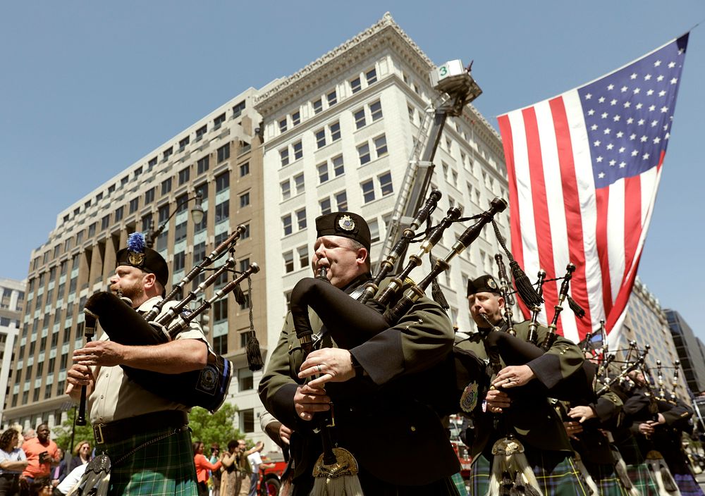 Members of the U.S. Customs and Border Protection Honor Guard play bagpipes at the start of the 25th Annual Blue Mass held…