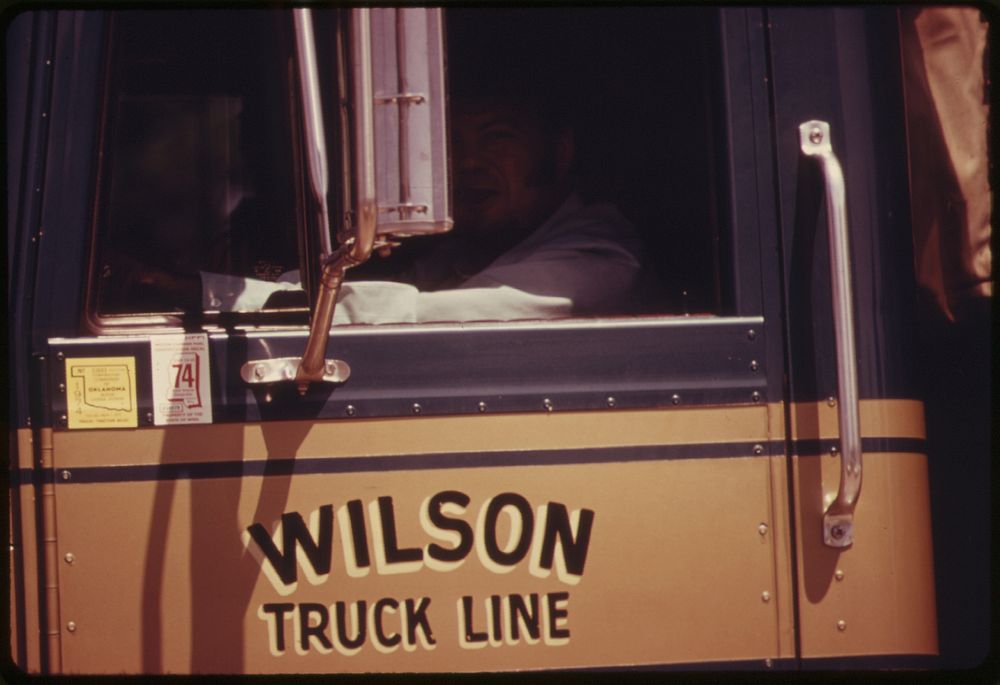 Driver in the Cab of a Large Cattle Truck in Cottonwood Falls, Kansas, near Emporia.