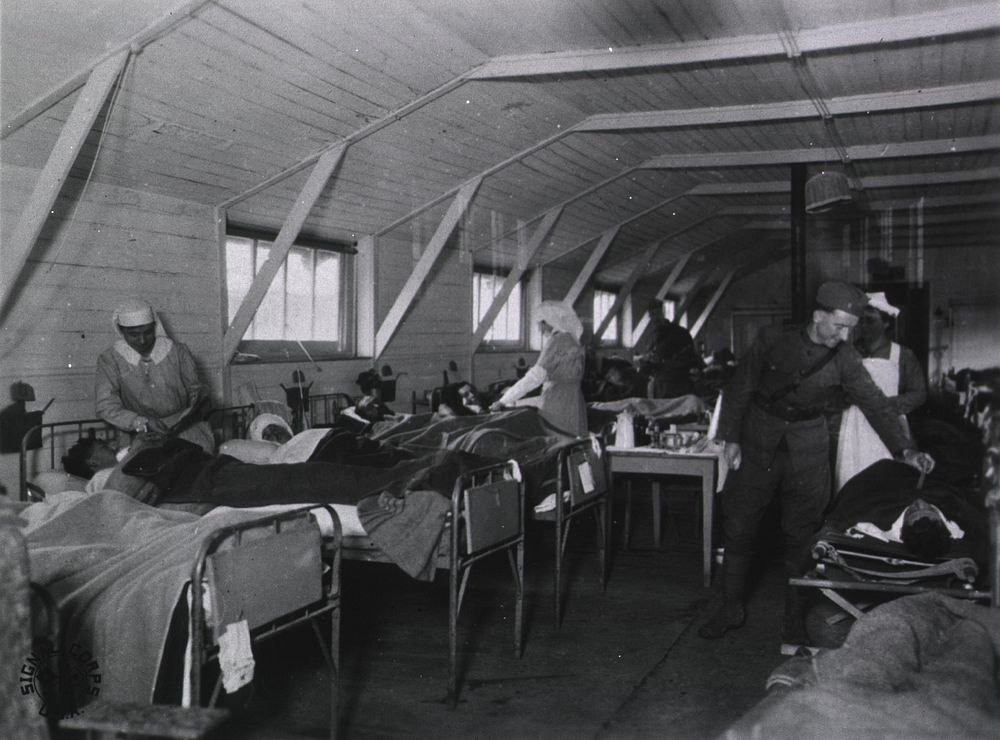 Nurses attending patients in ward m  (1918). Original public domain image from Flickr