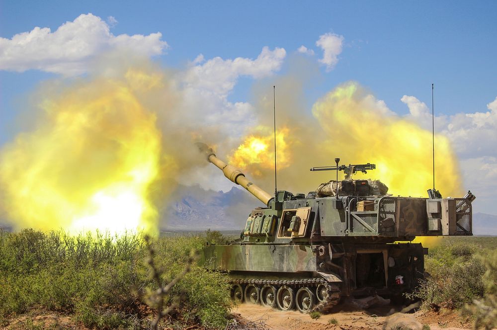 U.S. Soldiers with Bravo Battery, 2nd Battalion, 114th Field Artillery Regiment hone gunnery skills as they conduct table…