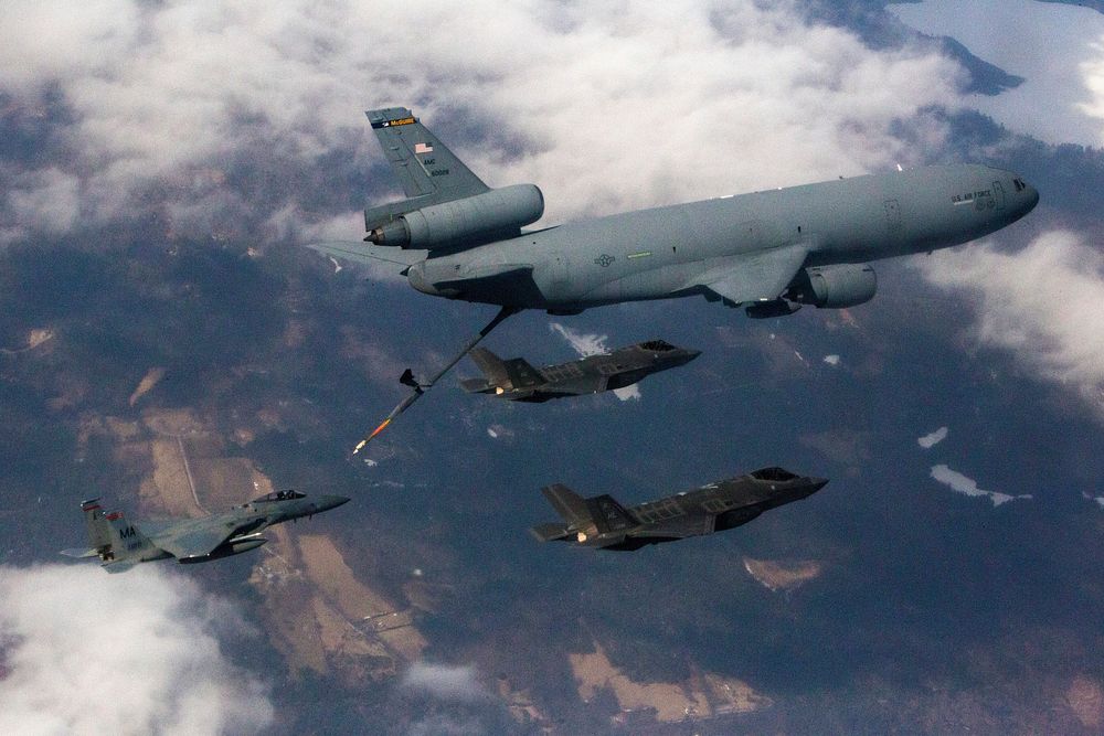 A pair of U.S Air Force F-35 Lightning II aircraft with the 419th Fighter Squadron fly alongside a KC-10 Extender crewed by…