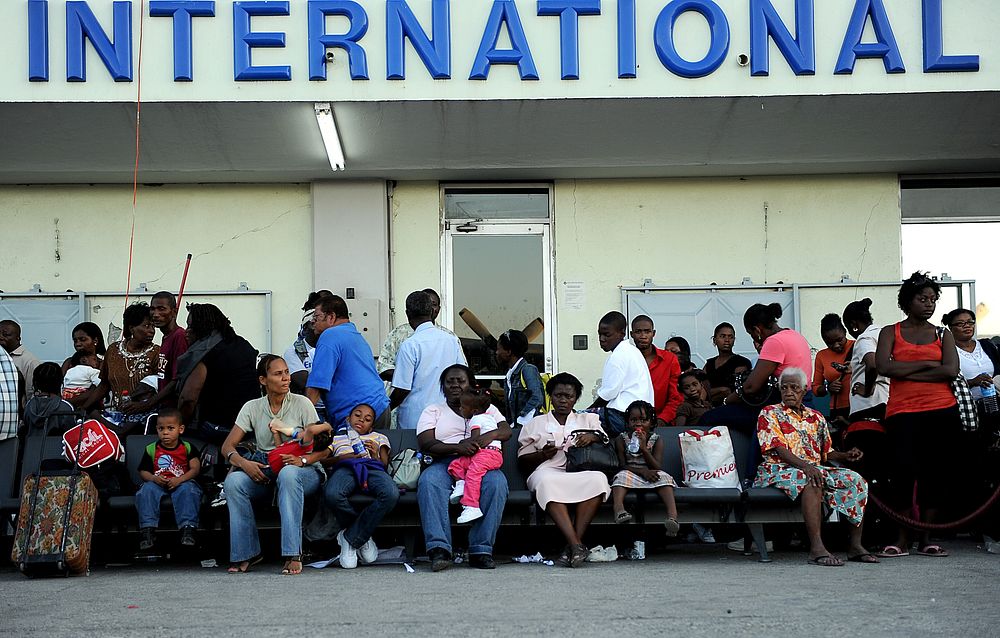 U.S. citizens wait to be evacuated from Toussaint L'Ouverture International Airport, Port-au-Prince, Haiti, January 17, 2010.