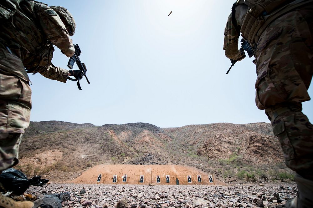 U.S. Soldiers assigned to Combined Joint Task Force-Horn of Africa fire M4 carbine rifles on a training range in Arta…