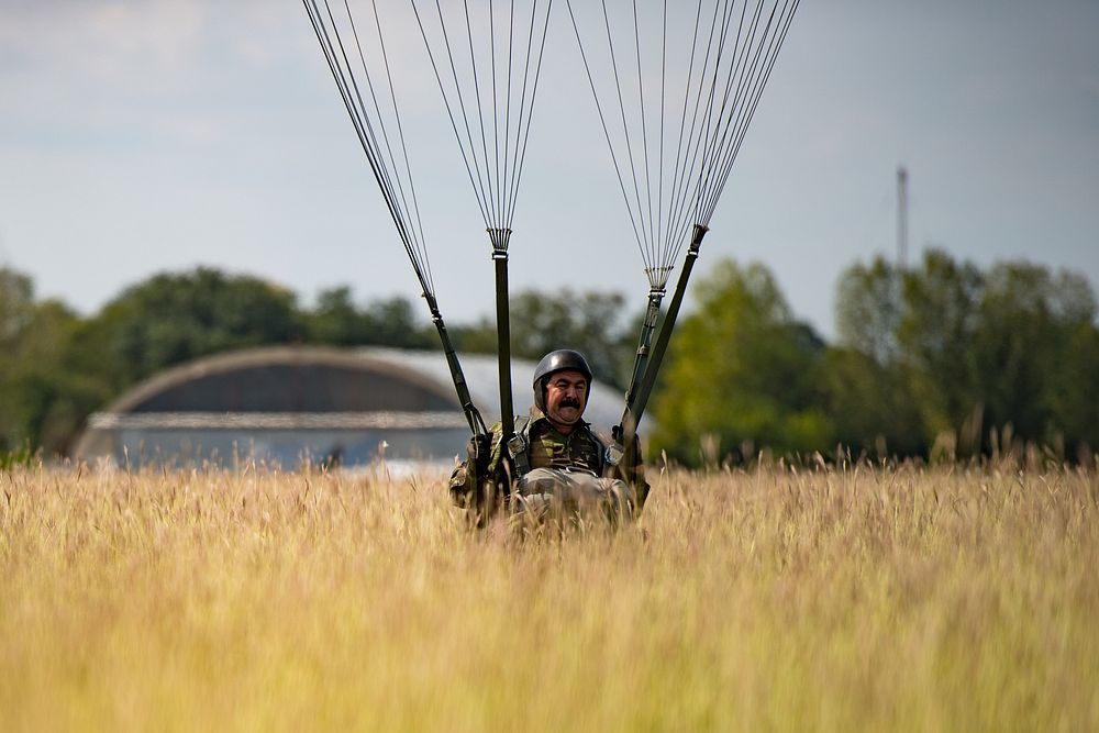 A Romanian air force paratrooper lands on a dropzone at Boboc Air Base, Romania, Aug. 23, 2018.