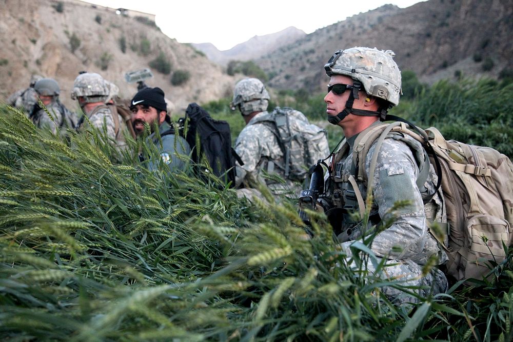 U.S. Army Sgt. Colin Unverzagt, an explosive ordnance disposal technician, provides security after exiting a CH-47 Chinook…