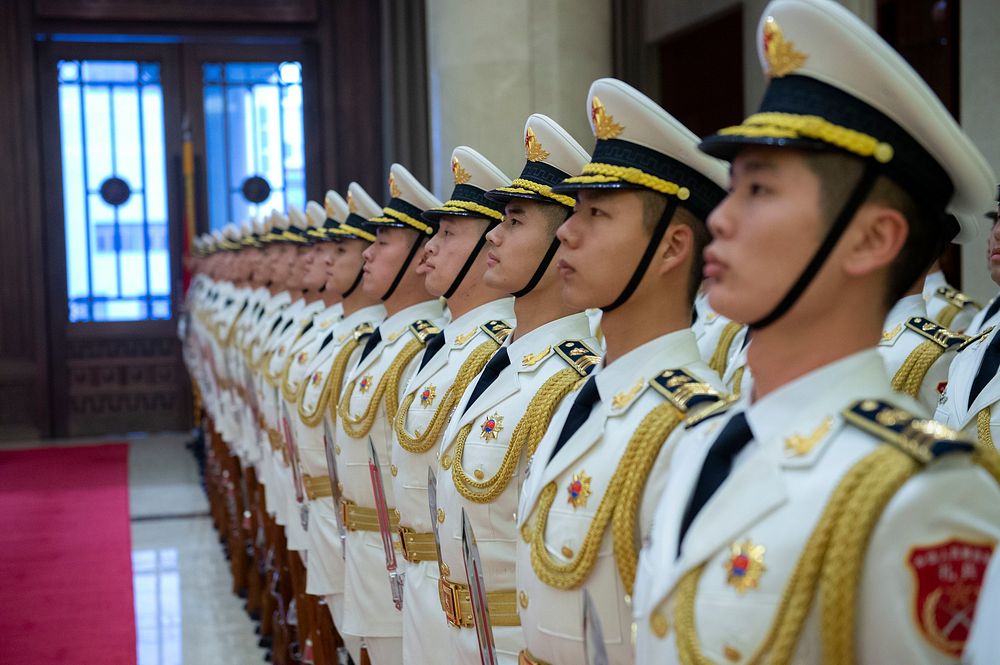 Chinese sailors stand in formation before a visit by Chief of Naval Operations (CNO) Adm. John Richardson to the People's…
