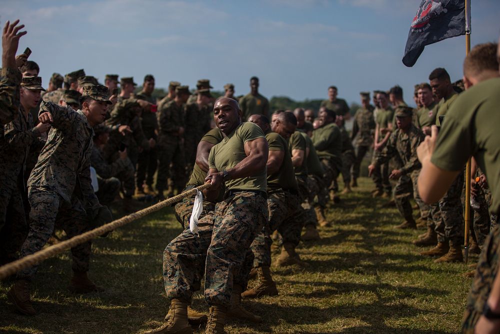 U.S. Marines with the 12th Marine Regiment, 3rd Marine Division, compete against each other during a field meet at Camp…