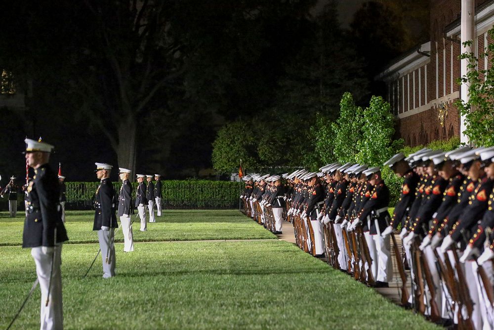 Marines with Alpha and Bravo marching companies, Marine Barracks Washington D.C., perform &ldquo;fix bayonets&rdquo; during…