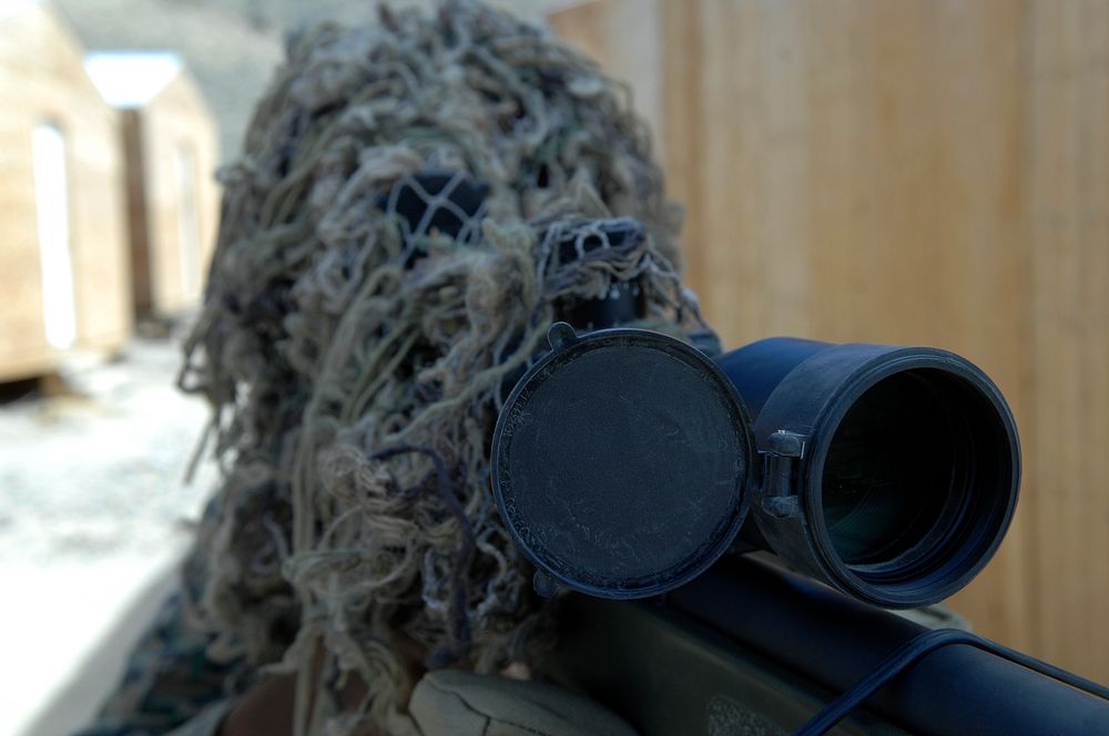 A participant in Javelin Thrust 2010 looks through a scope at Hawthorne Army Ammunition Depot, Nev., June 20, 2010.