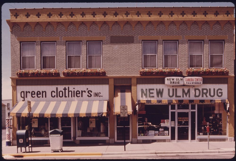 Restored Older Building in New Ulm, Minnesota, on Minnesota Street Contains Green Clothiers, Inc., and the New Ulm Drug. The…