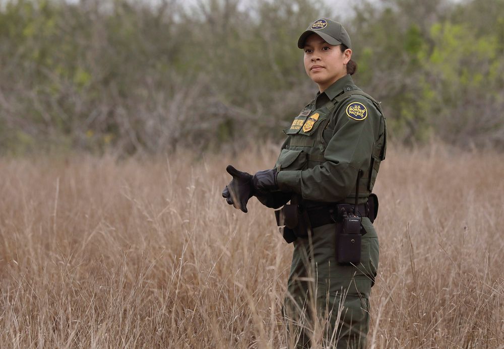 U.S. Border Patrol agents follow "sign" as they patrol vast ranch-lands near Hebbronville, Texas, March 8, 2019.