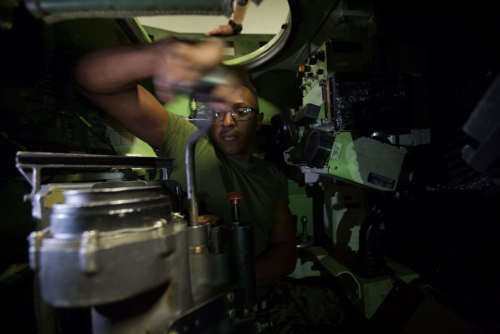 U.S. Marine Corps Cpl. Octavious Lee, a driver with Weapons Company, Battalion Landing Team, 2nd Battalion, 1st Marines…