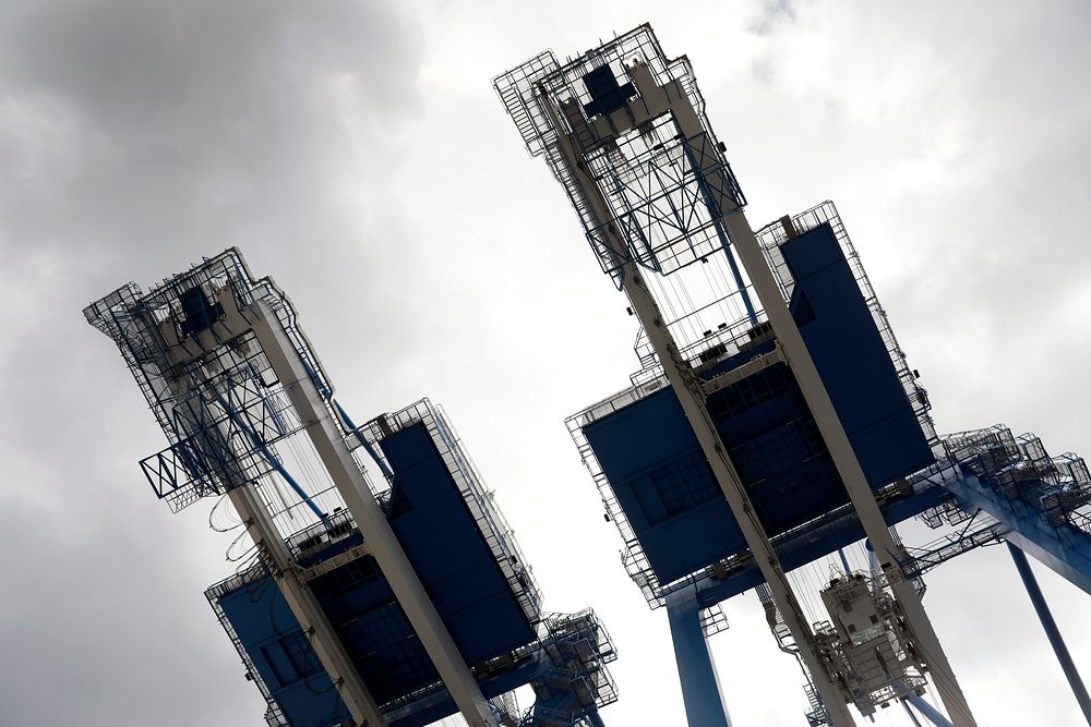 Massive cranes sit ready to offload incoming cargo ships at the Port of Philadelphia in Philadelphia, Pa., April 16, 2020.