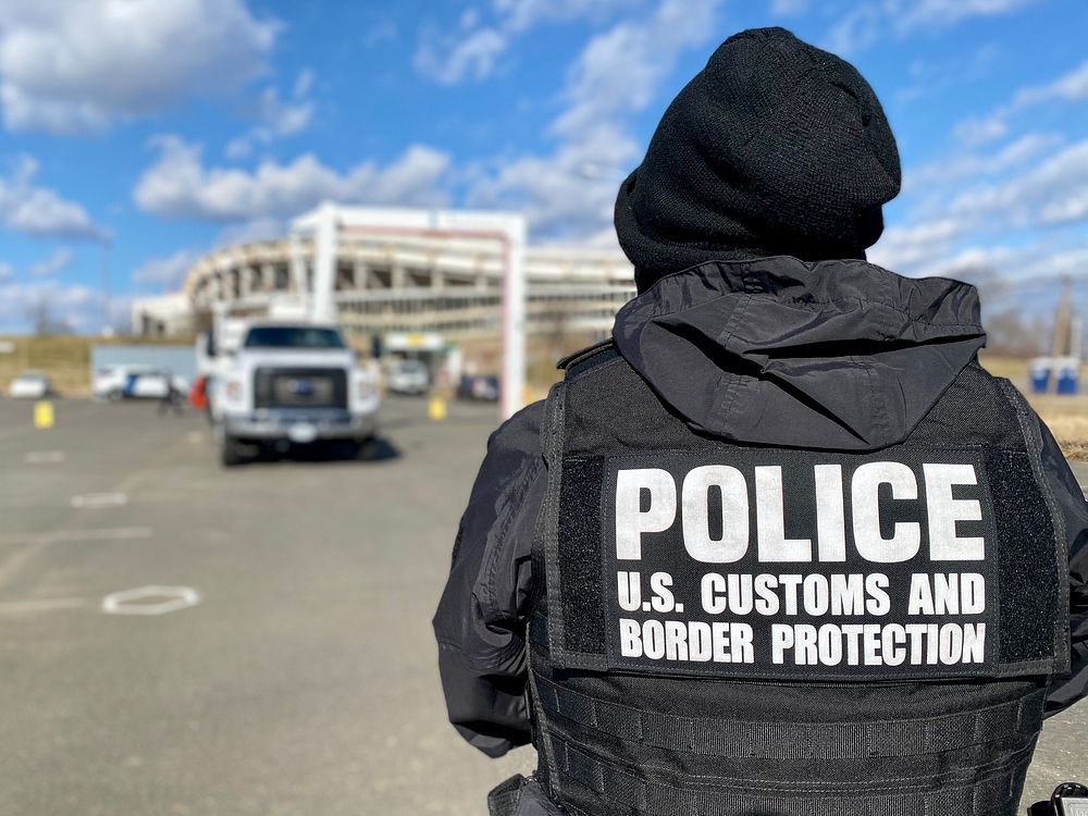 U.S. Customs and Border Protection officers with the Office of Field Operations stand their posts as they support security…