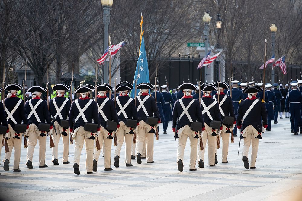 Military bands in period uniforms participate in the presidential escort on Pennsylvania Avenue in front of the White House…