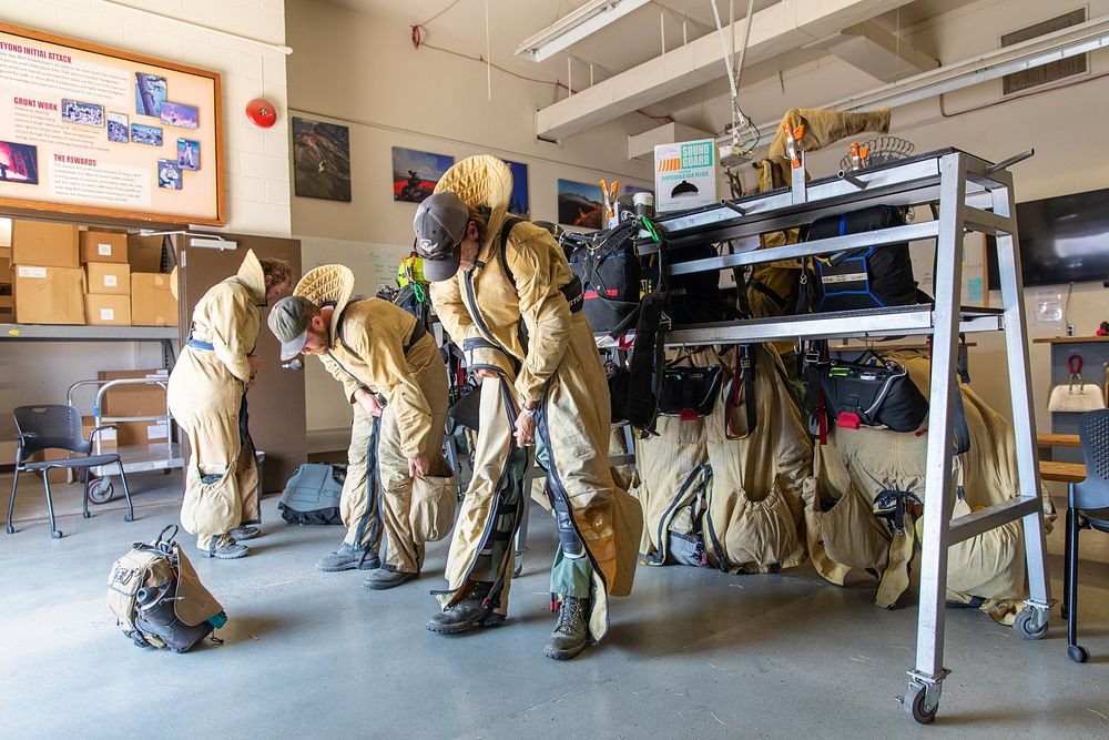 Bureau of Land Mangement smokejumpers suiting up for a training jump in Boise, Idaho.