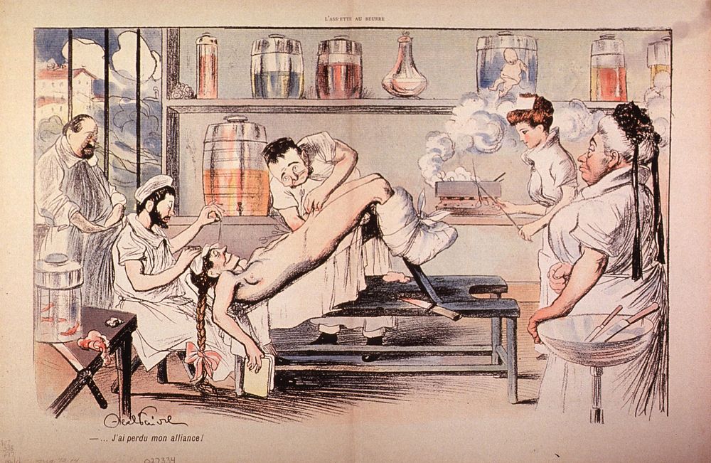 J'ai perdu mon alliance! An operating room scene with the female patient in position for gynecological sugery; the surgeon…