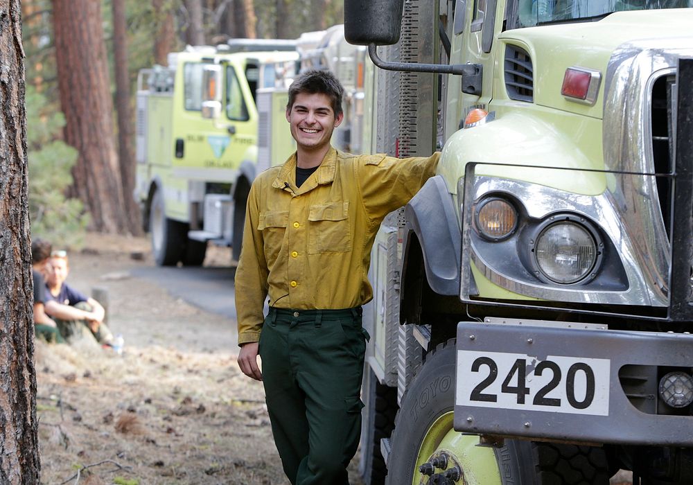 JUL 17 BLM Fire. CHILOQUIN, OR - JULY 17: Wildland firefighter Zane Davis smiles for the camera during a night shift on the…
