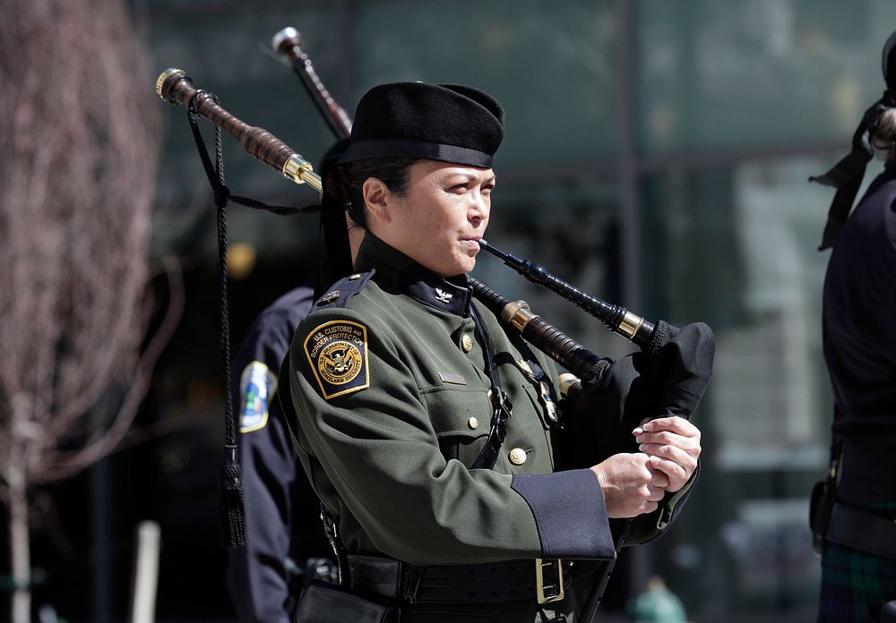 A U.S. Border Patrol agent plays the bagpipes as U.S. Customs and Border Protection officers and agents attend Blue Mass at…