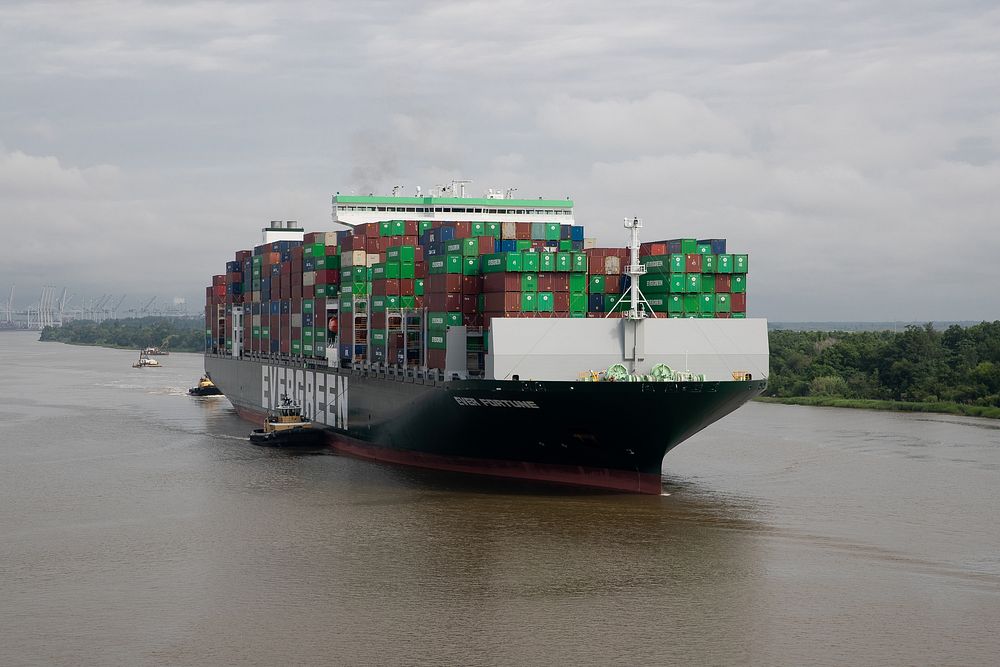 A container ship in the Savannah River departs the Port of Savannah, July 28, 2021.