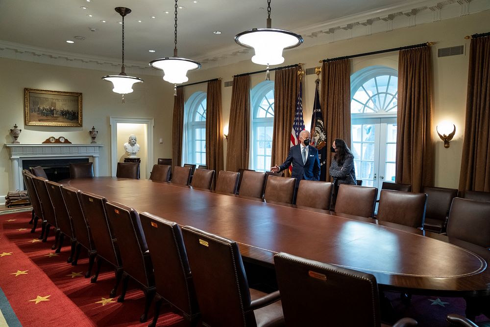 President Joe Biden gives a tour of the Cabinet Room to historian Heather Cox Richardson, Friday, February 25, 2022, at the…