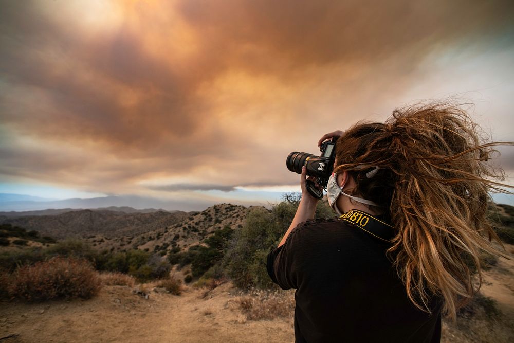 A photographer capturing smoke from the Apple Fire