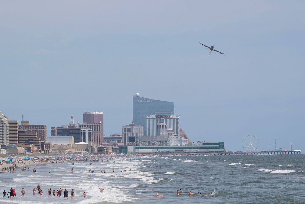 A New Jersey Air National Guard KC-135 Stratotanker with the 108th Wing flies along the beach during a practice run for the…