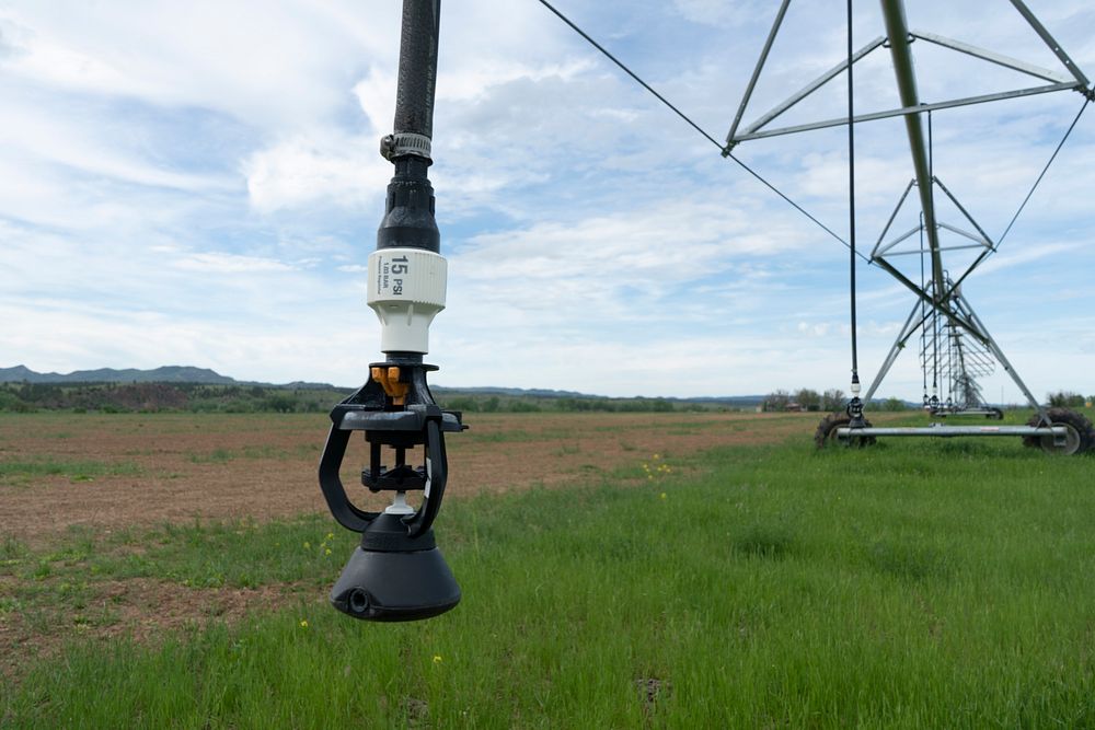 Pivot irrigation system on James Robinson's hayland within the Northern Cheyenne Indian Reservation. Robinson worked with…