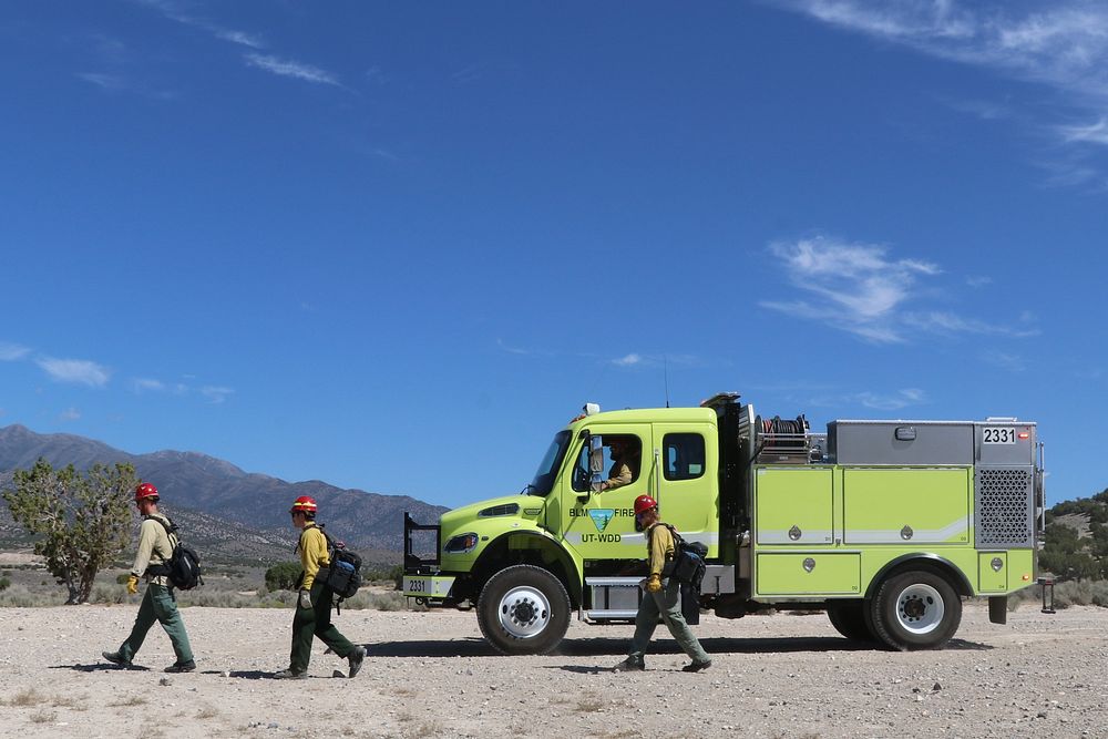 The crew of a Type 4 Fire Engine practicing mobile attack. 