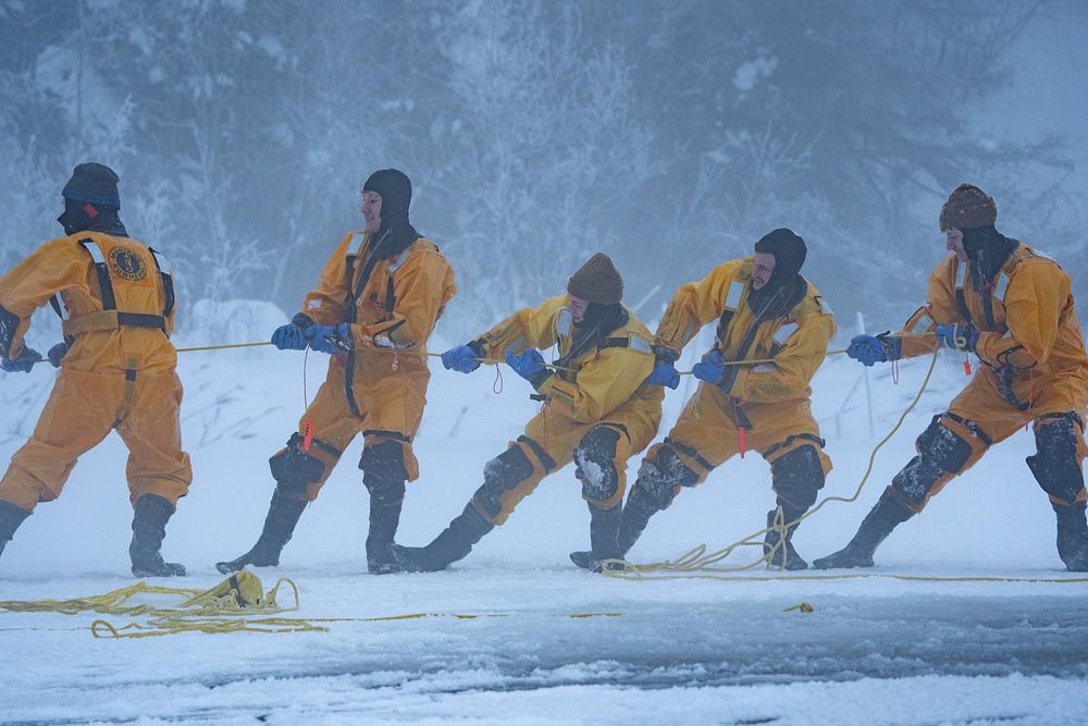U.S. Air Force fire protection specialists assigned to the 673d Civil Engineer Squadron conduct ice-rescue training at…