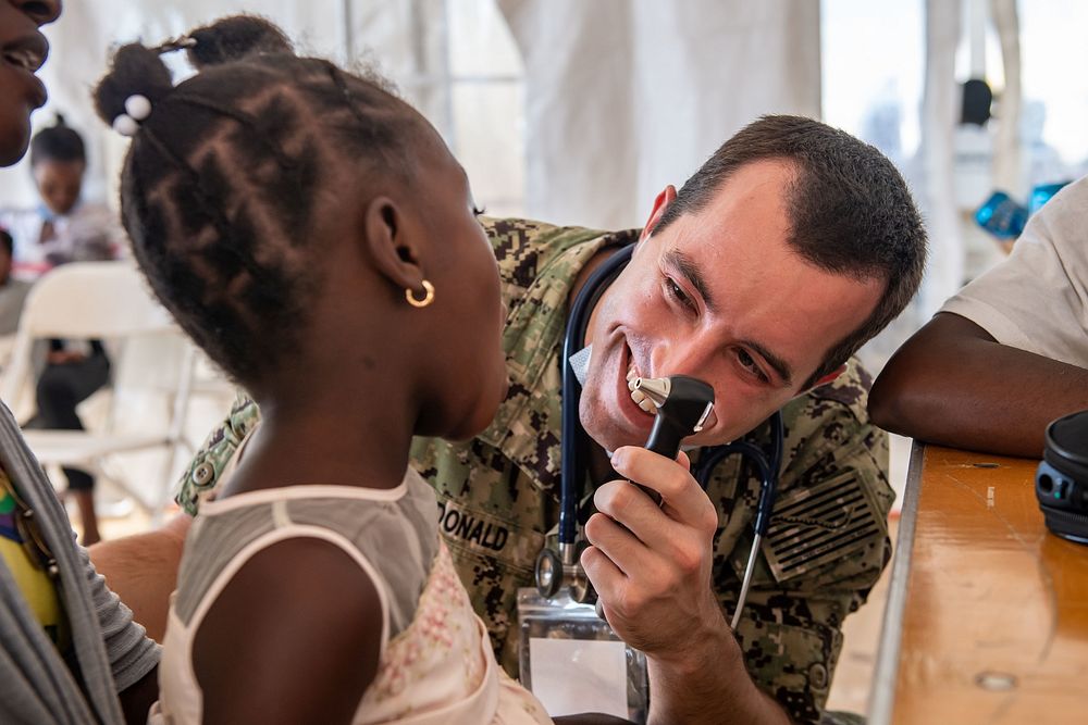 JEREMIE, Haiti (Dec. 16, 2022) Lt. Cmdr. Kyle McDonald, from Frankenmuth, Michigan, assigned to the hospital ship USNS…