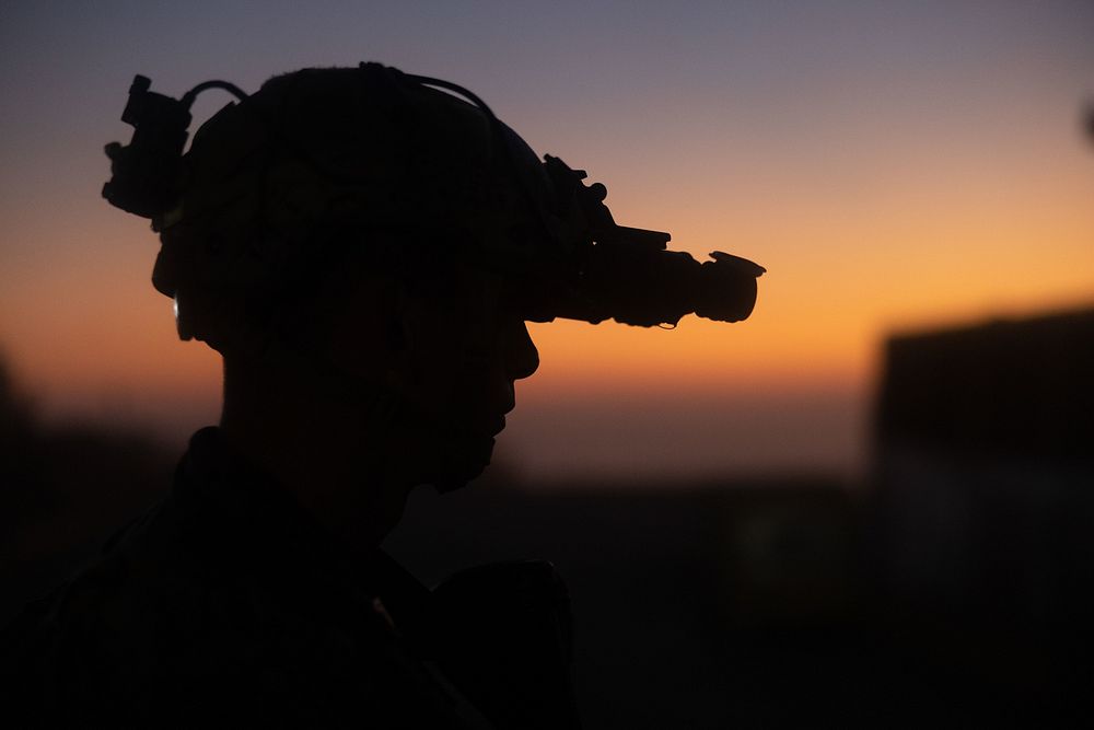 A U.S. Marine with 1st Battalion, 8th Marine Regiment, 2d Marine Division, observes his sector while clearing the medical…