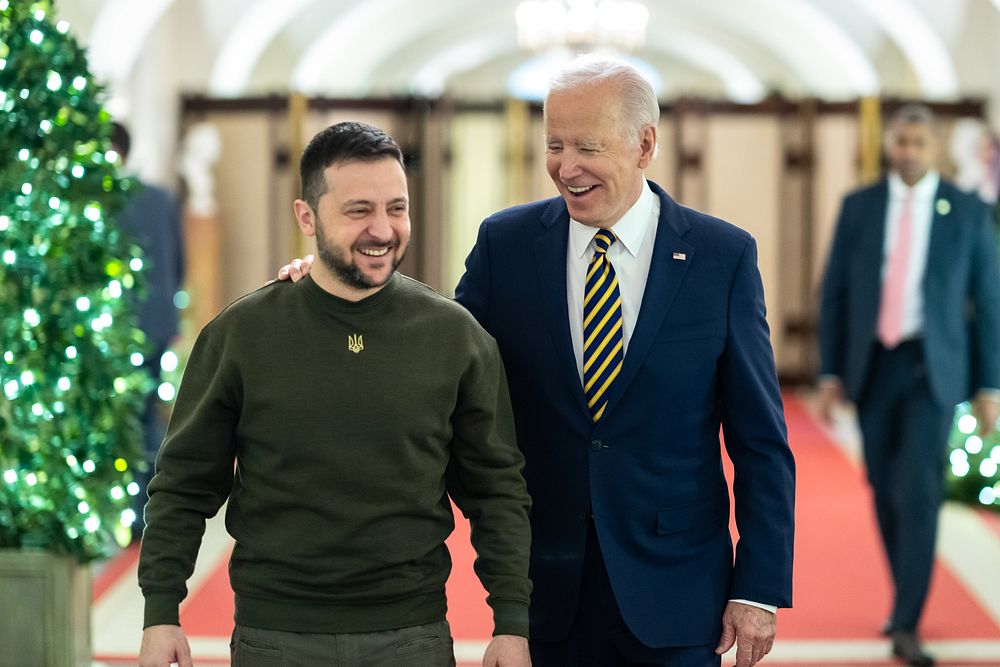 President Joe Biden walks with Ukrainian President Volodymyr Zelenskyy, Wednesday, December 21, 2022, in the Center Hall of…