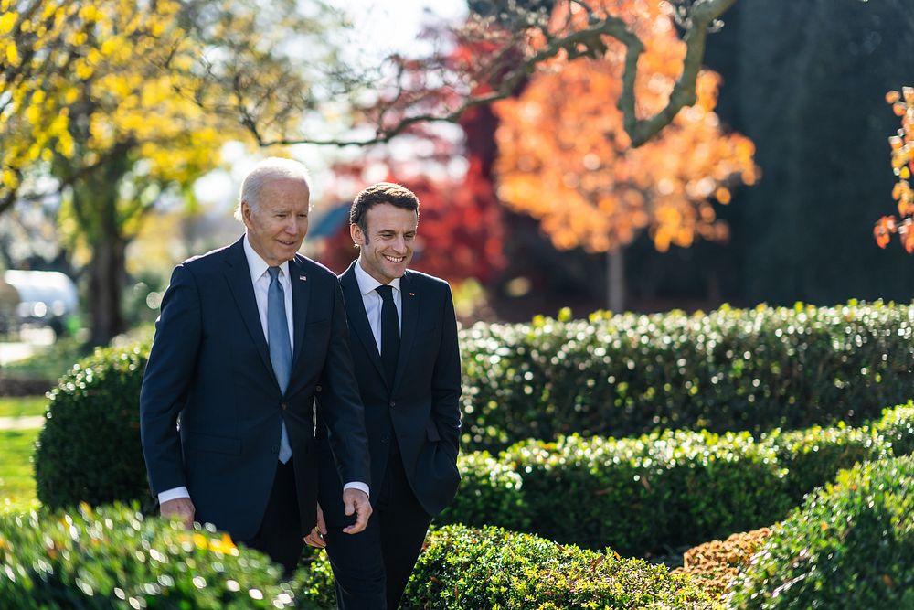 President Joe Biden and French President Emmanuel Macron walk together to a joint press conference in the East Room…